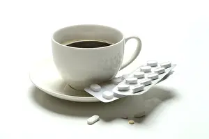 Coffee And Medication Prints: Coffee in a cup and medication
