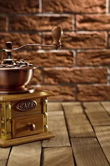 Coffee Grinder Prints: Coffee grinder with beans on the table