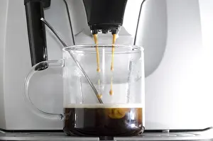 Empty Kitchen Scene Prints: Coffee Machine Making a Coffee