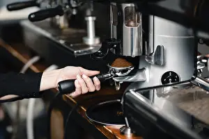 Coffee Preparation Process Prints: Coffee making, portafilter in grinder