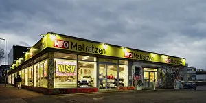 Modern Architecture Germany Prints: Cologne, germany, february 01 2023: building of the cologne ehrenfeld branch of the mattress discounter mfo matratzen