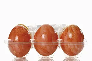 Close Up Photography Prints: Colored Easter eggs in blister pack