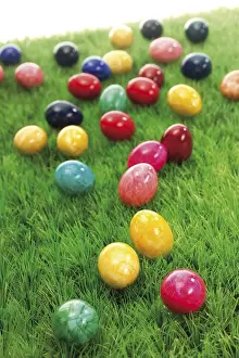 Colourful Easter Traditions Prints: Coloured Easter eggs on a green meadow