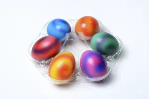 Painted Easter Eggs Prints: Coloured eggs in plastic packaging