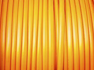 Empty Grocery Aisle Prints: Communication cable in orange on a roll