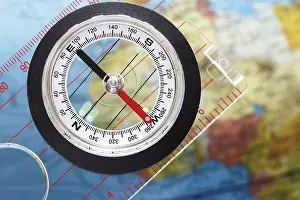 Studio Compass Shot Prints: Compass on globe