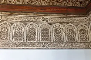 Ornate Wall Decoration Prints: Complex arabesque patterns adorn a wall in a traditional style