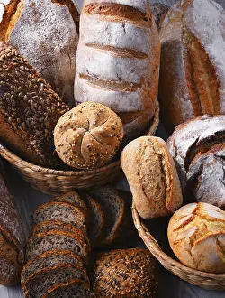Deserted Bakery Scene Prints: Composition with assorted bakery products in wicker basket