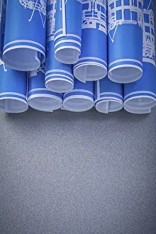 Blue Engineering Drawings Prints: Composition of blue engineering drawings on grey background construction concept