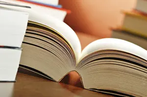 Book Arrangement On A Table Prints: Composition with books on the table