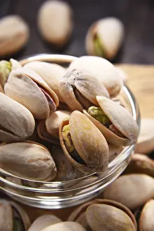 Uninhabited Table Setting Food Prints: Composition with bowl of in shell pistachios