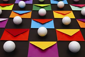 Holiday Composition Prints: Composition with colored envelopes and golf balls on the table