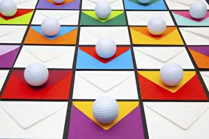 Colorful Office Supplies Prints: Composition with colored envelopes and golf balls on the table
