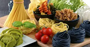 Empty Kitchen Table Setting Prints: Composition with different sorts of pasta on kitchen table