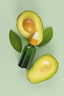 Eco Friendly Cosmetics Prints: A composition featuring a green bottle with a dropper