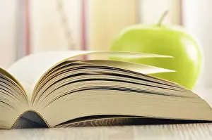 Deserted Library Scene Prints: Composition with green apple and books on the table