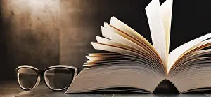 Deserted Library Scene Prints: Composition with open book and glasses on the table