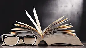 Educational Institution Art Print Prints: Composition with open book and glasses on the table