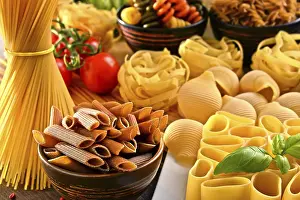 Kitchen Table Setup Prints: Composition with variety of pasta on kitchen table