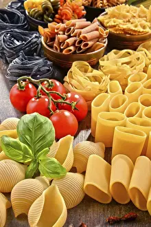 Kitchen Table Setup Prints: Composition with variety of pasta on kitchen table