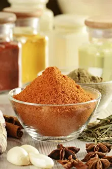 Kitchen Table Setup Prints: Composition with variety of spices on kitchen table