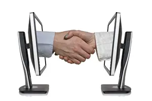 Wireless Communication Prints: Two computer monitors and hands in handshaking