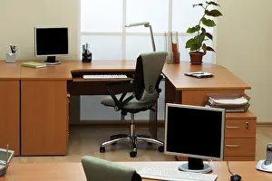 Modern Office Prints: Computers on the desks in a modern office