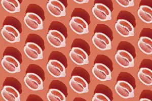 Healthy Eating Concept Prints: Conceptual pattern with halves of lemon with shadow on red background