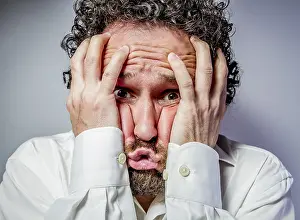 White Shirt Portrait Prints: Concern for the future, man with intense expression