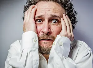 White Shirt Portrait Prints: Concern for the future, man with intense expression