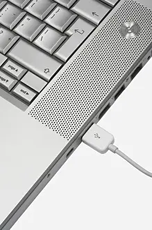 White Studio Background Photo Prints: Connection to modern notebook on a white background