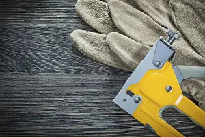 Industrial Safety Gear Prints: Construction stapler pair of protective gloves