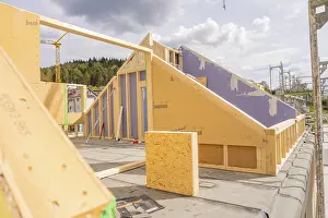 Construction Site In Southern Germany Prints: Construction of a timber house in the shell phase on a construction site