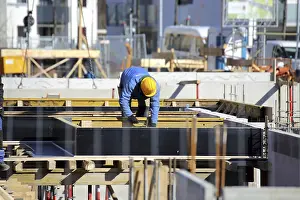 Construction Labor Prints: Construction work on the foundations of a large apartment building