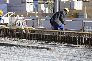 Steel Reinforcement Techniques Prints: Construction work on the foundations of a large apartment building