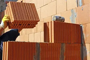 Bricklayer Detail Prints: Construction worker (bricklayer) on the building site