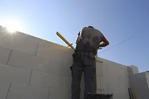 Bricklayer Detail Prints: Construction worker (bricklayer) on the building site