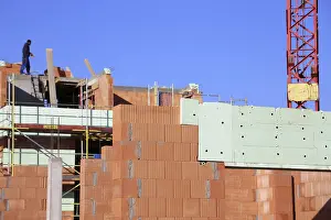 Residential Building Prints: Construction worker (bricklayer) on the building site