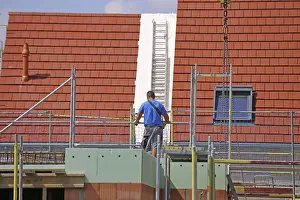 Mutterstadt Development Area Prints: Construction worker (bricklayer) on the building site (Mutterstadt development area)