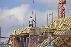 Mutterstadt Development Area Prints: Construction worker (bricklayer) on the building site (Mutterstadt development area)
