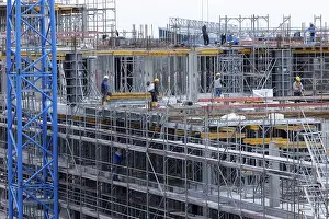 German Construction Site Prints: Construction worker on a large building site
