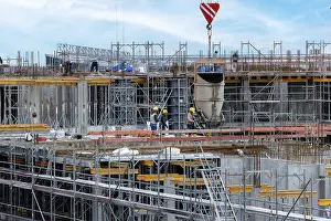 Empty Construction Area Prints: Construction worker on a large building site