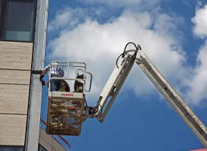Construction Worker Prints: Construction worker in safety cage