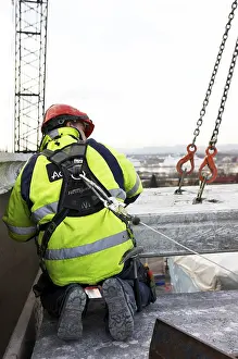 Construction Site Prints: Construction worker working outside building
