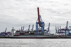 Container Ship Hamburg Prints: Container ship, loading cranes and stacks of containers