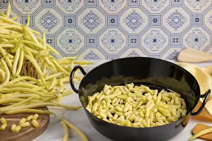 Scarlet Runner Bean Prints: A cooking pot full of sliced beans on a kitchen worktop