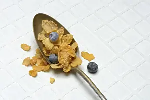 Cornflakes With Blueberries Prints: Cornflakes and blueberries in spoon, Breakfast