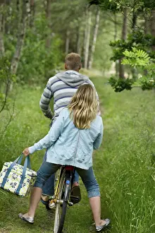 Norway Tourist Attractions Prints: Couple on one bicycle
