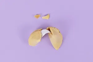 No People In The Room Prints: Cracked fortune cookie with note without text