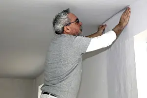 One Person Construction Team Prints: Craftsman (painter) for wallpapering work